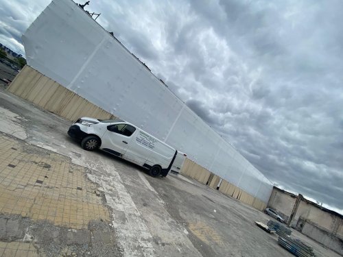 Protection bâches thermo soudé sur échafaudage « cache vu »